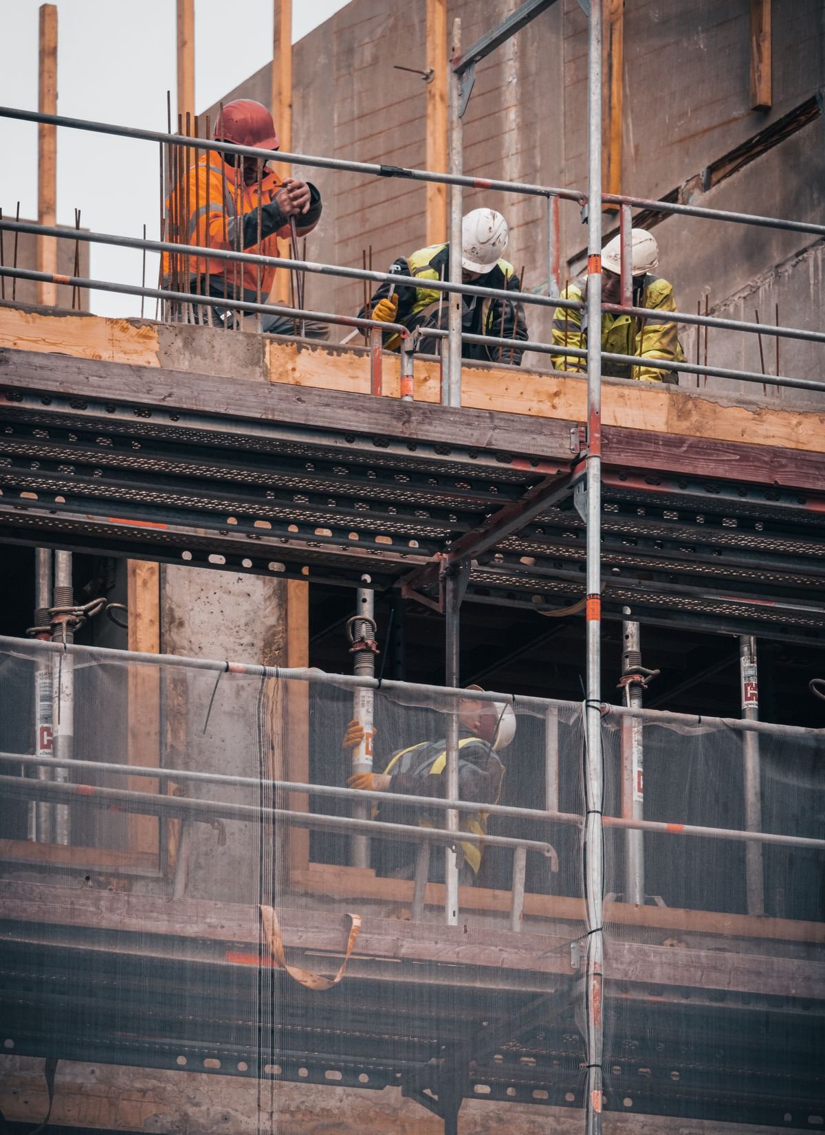 Foreign work permit holders on a Singapore construction site subject to the foreign worker levy