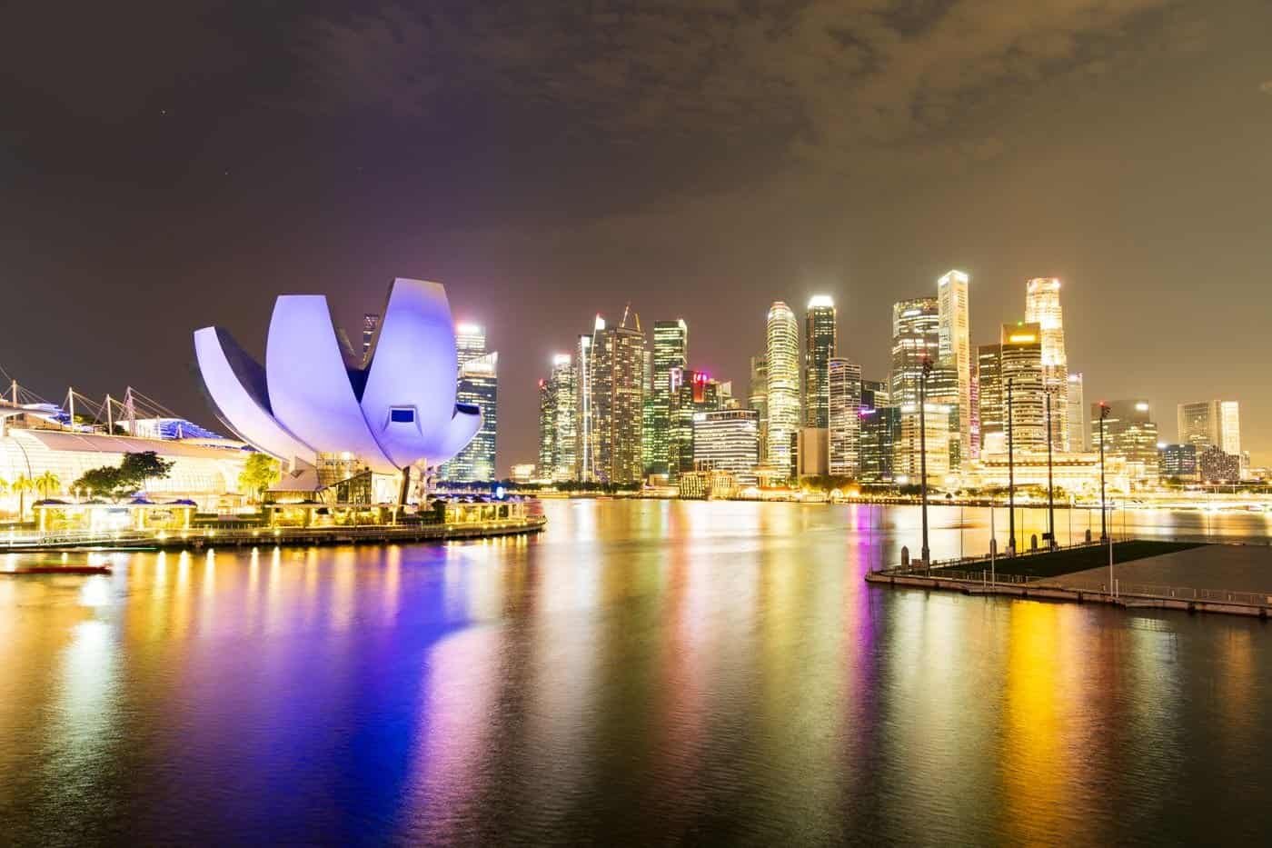 Singapore Marina Bay skyline featuring the ArtScience Museum at night